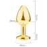 Sunfo - metalen buttplug met rode steen - goudkleurig
